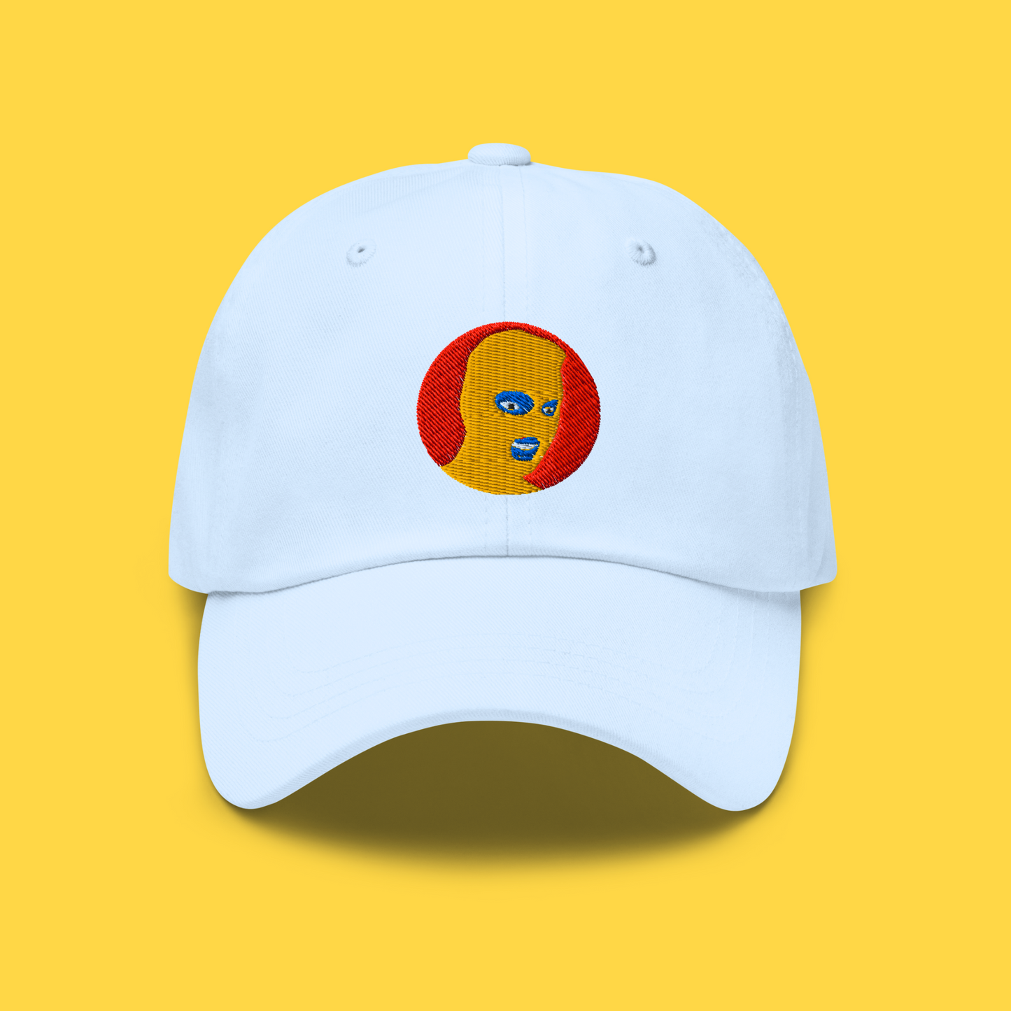 White hat mockup for the OG Edition logo variant. Logo features a yellow mask and red background.