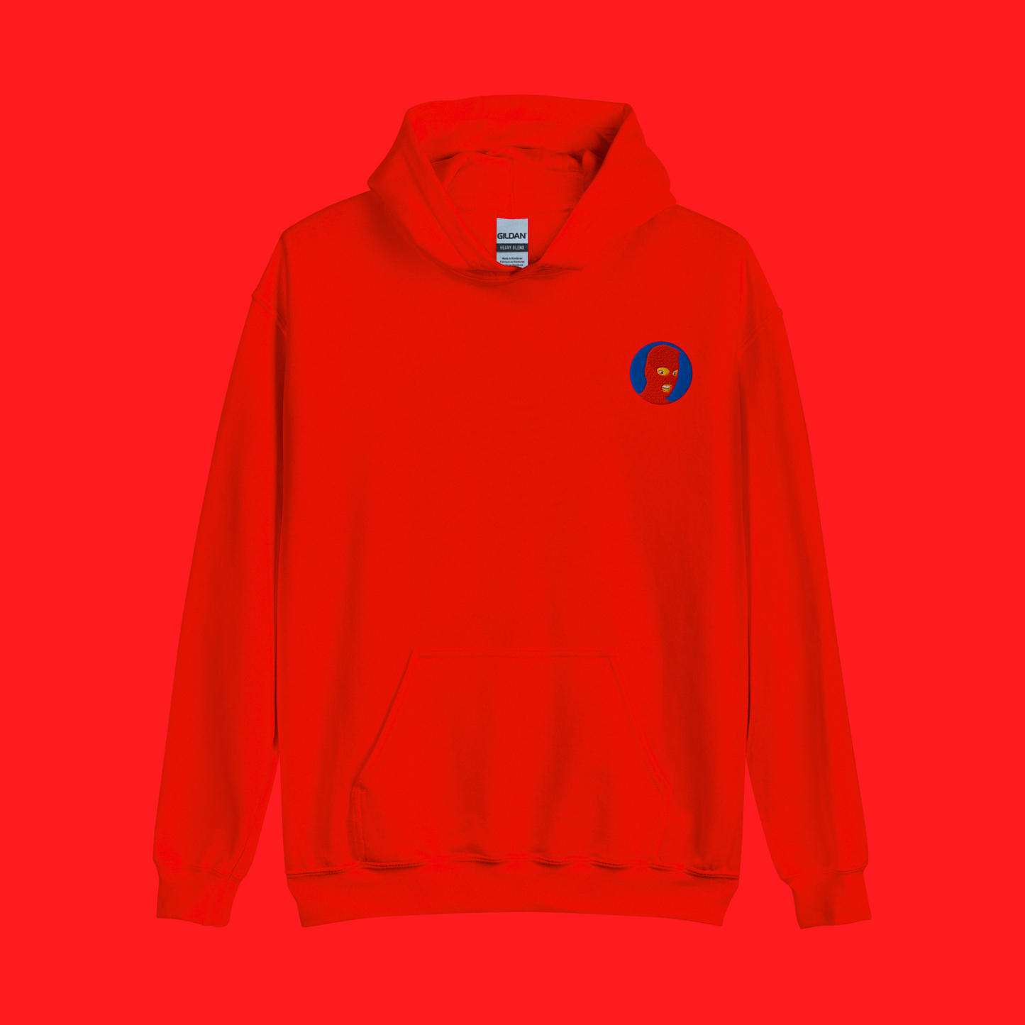 Red hoodie mockup for the Red Eye Collection logo variant. Logo features a red mask and blue background.